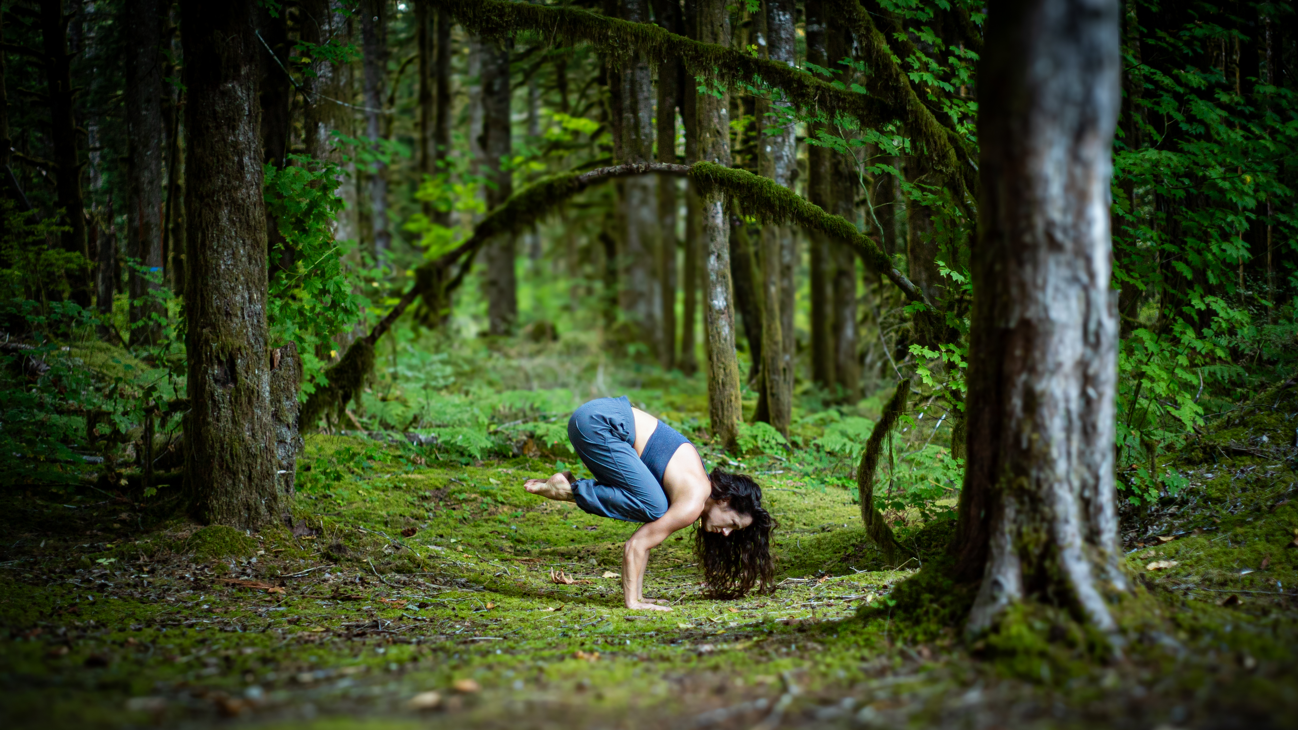 Carly practicing yoga outdoors in the Pacific Northwest