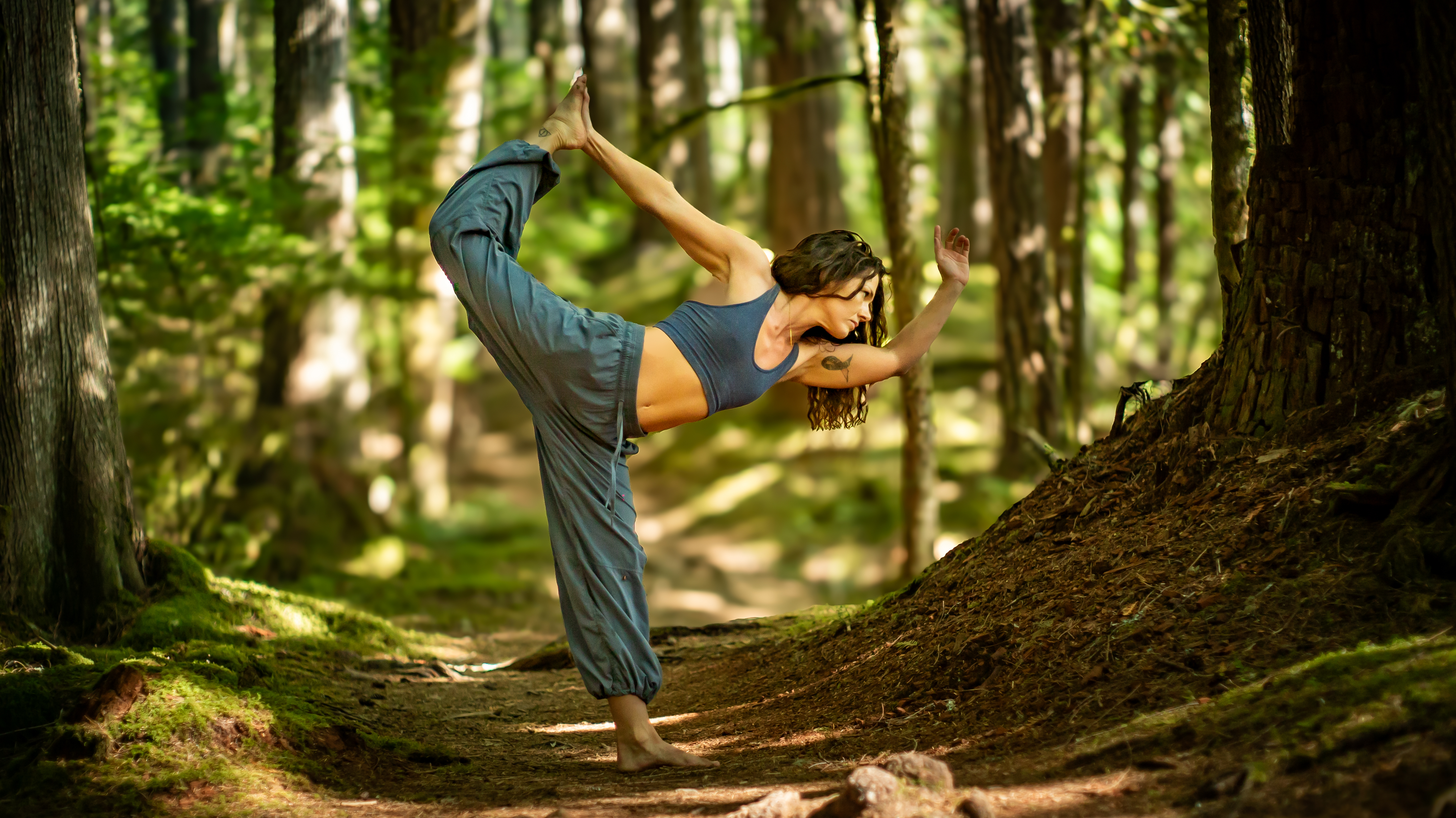 Carly practicing yoga outdoors in the Pacific Northwest