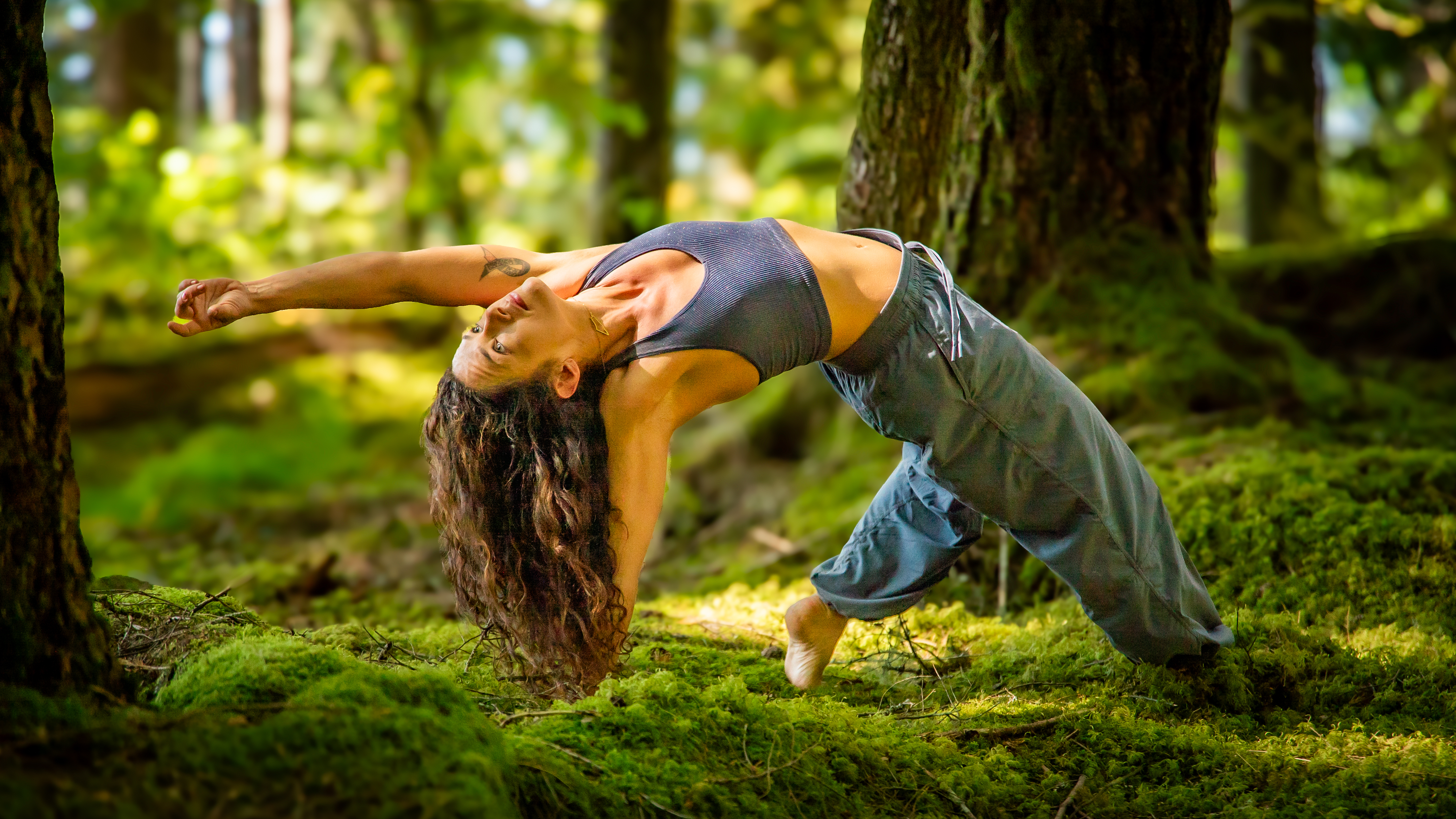 Carly practicing yoga outdoors in the Pacific Northwest